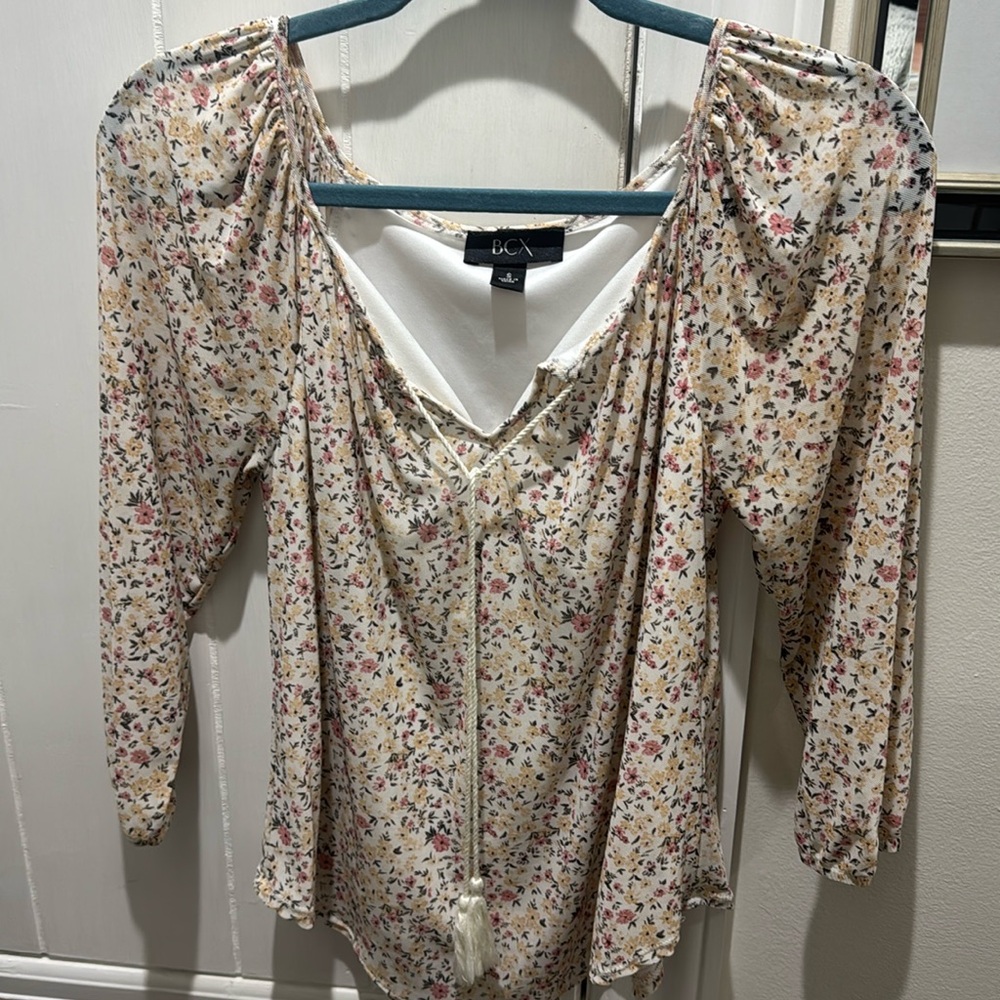 Women’s top.  Flowy, flower and fun